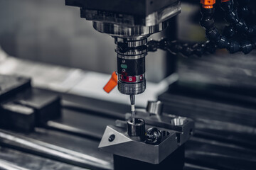 Metalworking, equipment, machining, industrial, technology, manufacturing concept. Automatic cnc laser cutting machine working with cylindrical metal workpiece with many sparks at factory, 