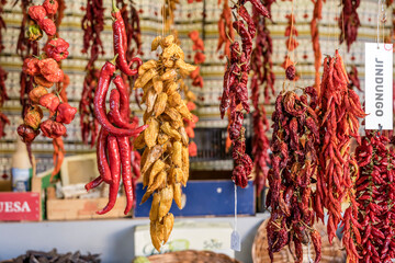 yellow and red chili peppers at covered market, Funchal, Madeira