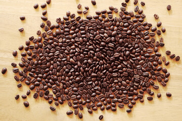 coffee beans on wood table. coffee seed