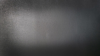 Black genuine leather texture background. Natural skin leather with texture design pattern
