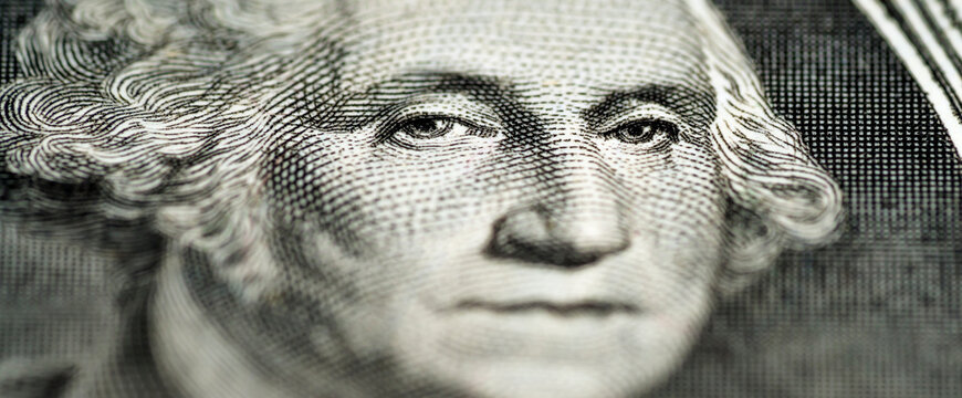 Portrait of George Washington on 1 dollar bill, close-up. Banner