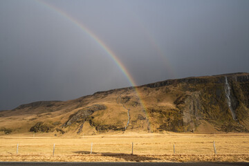 Fototapeta na wymiar Rainbow over the road - Iceland