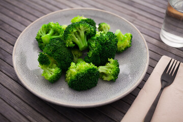 boiled broccoli inflorescences in plate