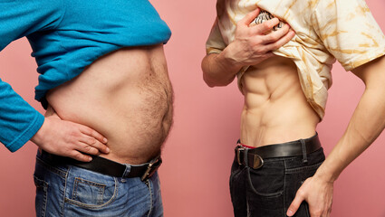 Cropped image of male body. Models show their bellies before and after losing weight. Comparison before and after, concept of healthy eating, active lifestyle.