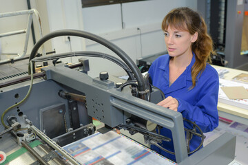 female printing technician at work