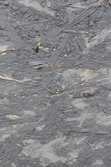 Texture of plywood with a peeled coat of paint.