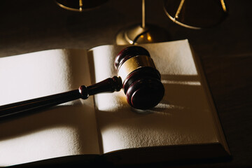 Business and lawyers discussing contract papers with brass scale on desk in office. Law, legal...