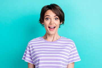 Portrait of adorable positive optimistic woman with bob hairdo wear striped t-shirt impressed staring isolated on teal color background