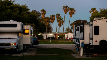 Camping in Camper van an trailer at campsite 