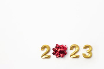 2023 Golden Numbers on White Table. Modern New Year Background. Creative Greeting Card. Flat Lay, Top View, Copy Space. Banner Design. Minimal Festive Mock Up with Numbers. Time to Celebrate Holiday