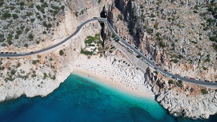 Aerial panoramic top view of the beach in the gorge Kaputas Beach view from the sea Wild beach with azure water Turkish resorts Aegean Sea 
