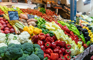 close-up of market stall with colorful fresh vegetables in the Great Market Hall in Budapest