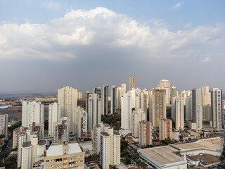 Fototapeta premium Average city with lots of buildings and rain coming after months