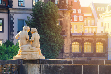 Cityscape - view of the sculpture of a pair of cupids against the backdrop of Dresden Castle...