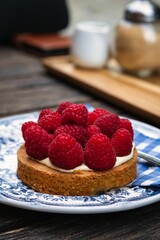 raspberry tart on a plate