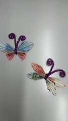 Give money in the shape of butterflies