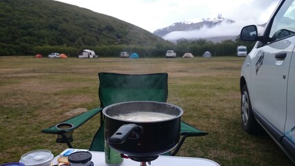 Enjoying a day of camping while cooking with the outdoor camping gas