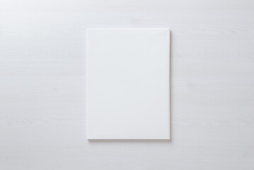 Vertical blank art canvas frame mockup for arts painting and photo presentation mockup. Laid on the floor - Powered by Adobe