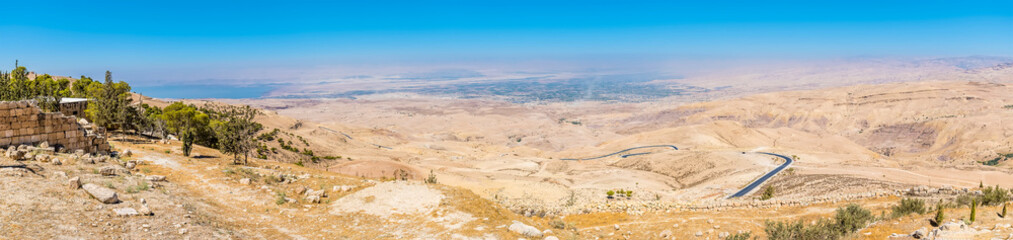A view from Mount Nebo, Jordan towards the Jordan Valley and the Dead Sea below in summertime