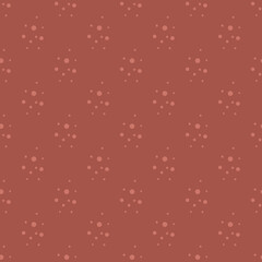 Dotted vector seamless pattern on brown background in flat style. Stock illustration