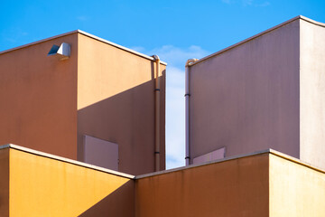 Detail of the facade of a building with geometric shapes and colors