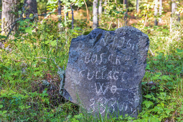 Old milestone by the roadside