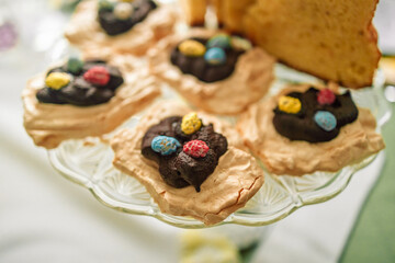 Different type of cakes on a plate and with side light