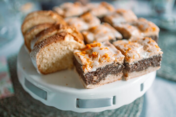 Assortment of confectionery, different types of cakes and desserts on the table.