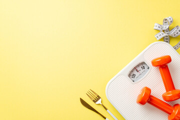 Slimming concept. Top view photo of red dumbbells cutlery tape measure and scales on isolated pastel yellow background with empty space