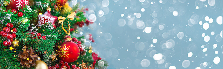 Beautiful Christmas background with a Christmas tree. Selective focus.