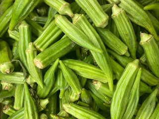 Fresh green okra, close up view of okra, healthy food, background