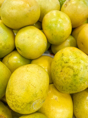 Grapefruit with vitamins, closeup view, backgrounds, top view of grapefruit in supermarket