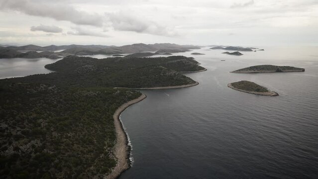 Croatia, Dugi Otok island, aerial view of the Salty lake in nature park Telascica, spectacular cliffs above the