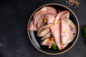 sausage with nuts meat plate delicious snack mortadella, pistachios, ham healthy meal food snack diet on the table copy space food background rustic top view
