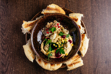 hummus with butter, herbs and pitta