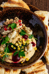hummus with butter, herbs and pitta