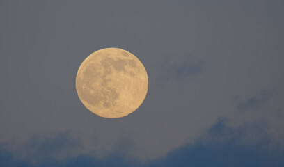 The moon on a background of clouds.