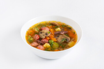 vegetable soup with sausages on white background