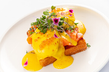 belgian waffle with poached egg and salmon