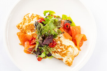 omelet with smoked salmon and salad