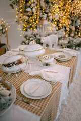 Cozy atmosphere of Christmas, holidays and New Year in the details of the interior of the Christmas room. Christmas decorations luxury