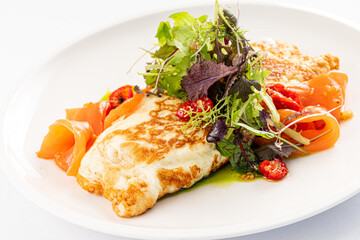 omelet with smoked salmon and salad