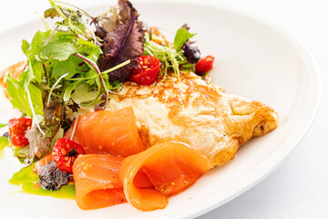 omelet with smoked salmon and salad