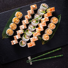 tasty sushi on the black background