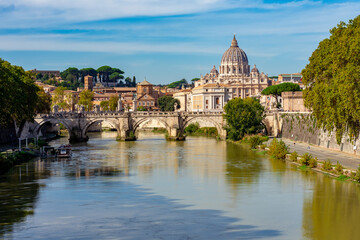 Obraz na płótnie Canvas St Peter's basilica in Vatican and St. Angel bridge over Tiber river in Rome, Italy