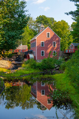 Fototapeta premium Russell Mill on River Meadow Brook in Russell Millpond in town of Chelmsford, Massachusetts MA, USA. 
