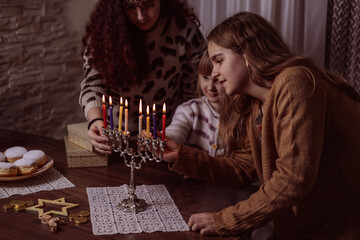 family celebration of the Jewish holiday Hanukkah  at home
