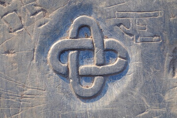 celtic knot carved in stone