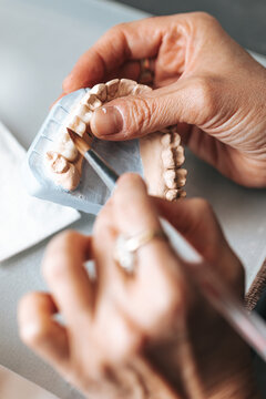 Dental Technician Making Ceramic Crowns