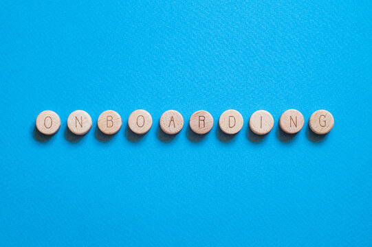 Onboarding - word concept on cubes - Powered by Adobe